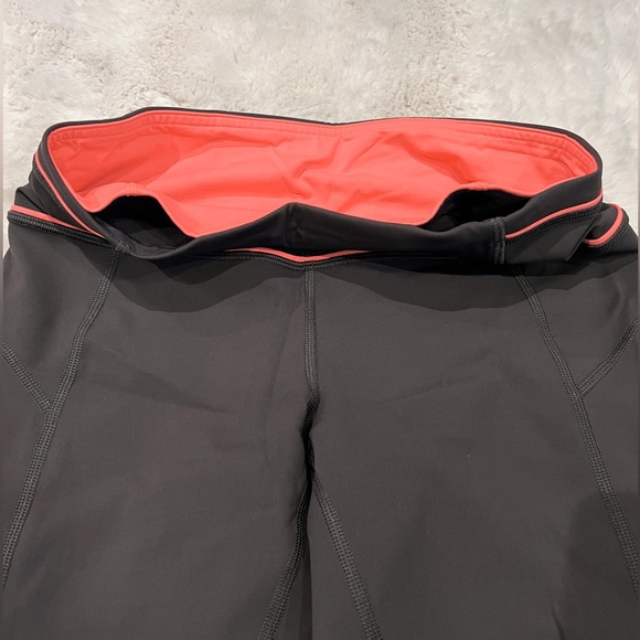 Lululemon capris. Like new. Barely worn. Size 6. Dark grey with coral. - Picture 8 of 10